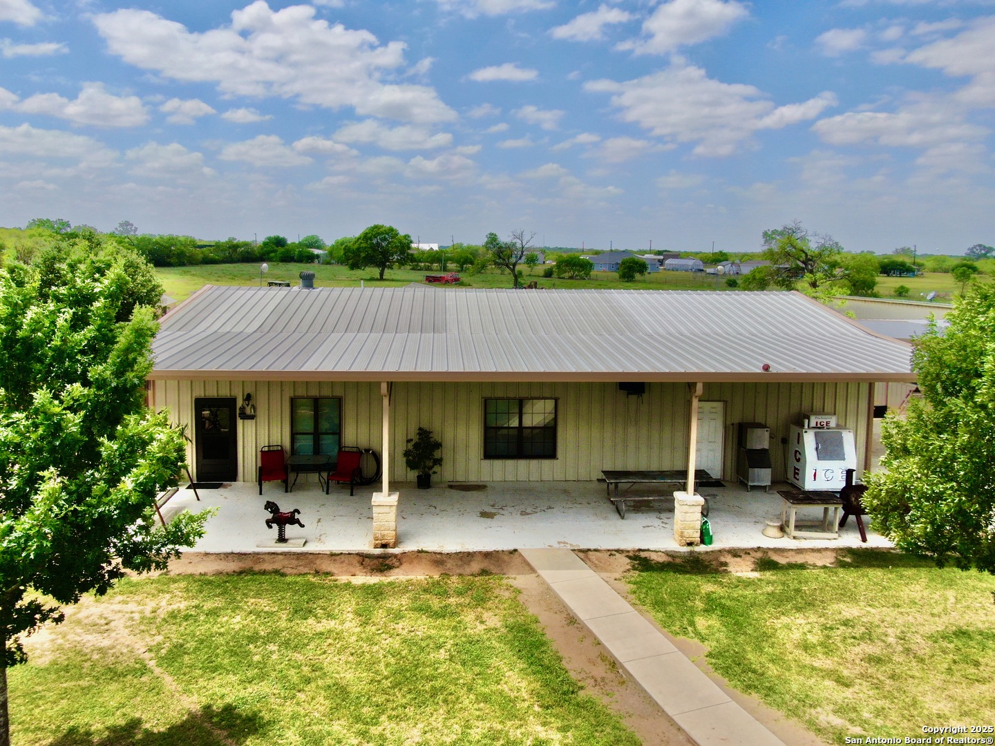 12365 Rudolph Road, Unit 3 Atascosa, TX 78002 - Photo 20 of 42 a view of a house with swimming pool and furniture