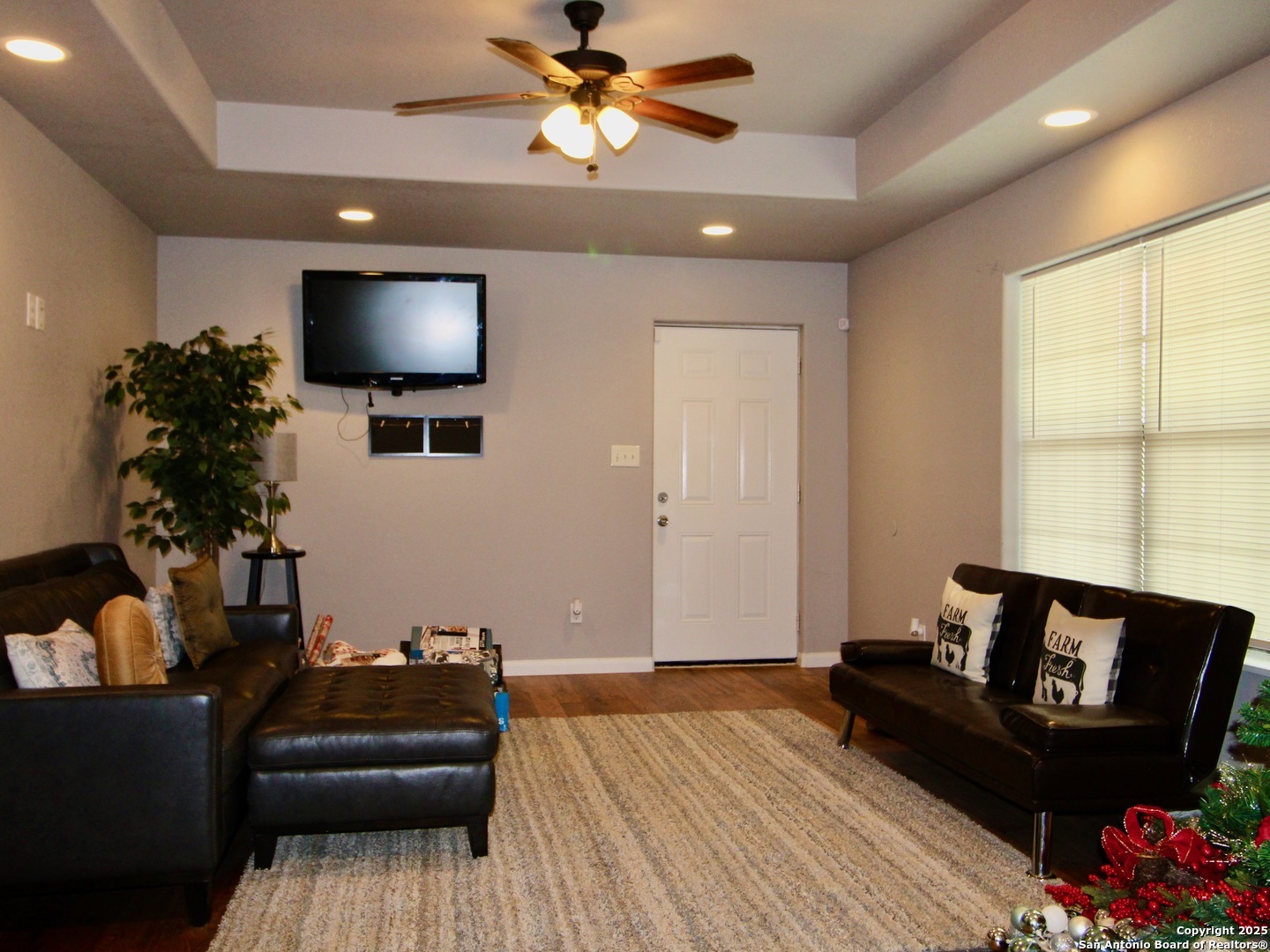 12365 Rudolph Road, Unit 3 Atascosa, TX 78002 - Photo 21 of 42 a living room with furniture and a flat screen tv