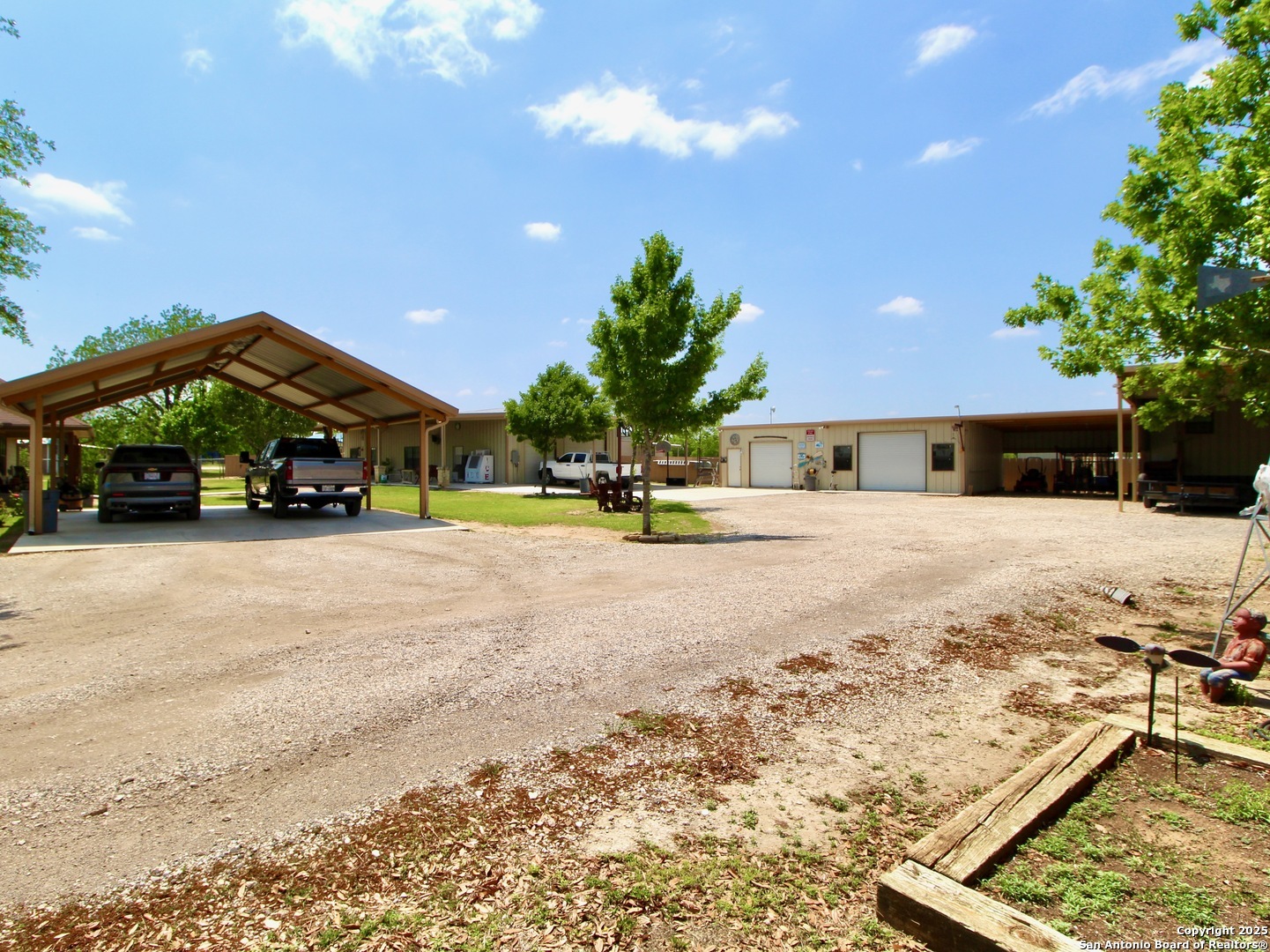 12365 Rudolph Road, Unit 3 Atascosa, TX 78002 - Photo 33 of 42 a view of a house with a yard and sitting area