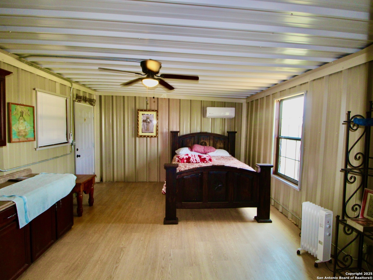 12365 Rudolph Road, Unit 3 Atascosa, TX 78002 - Photo 39 of 42 a bedroom with bed and window