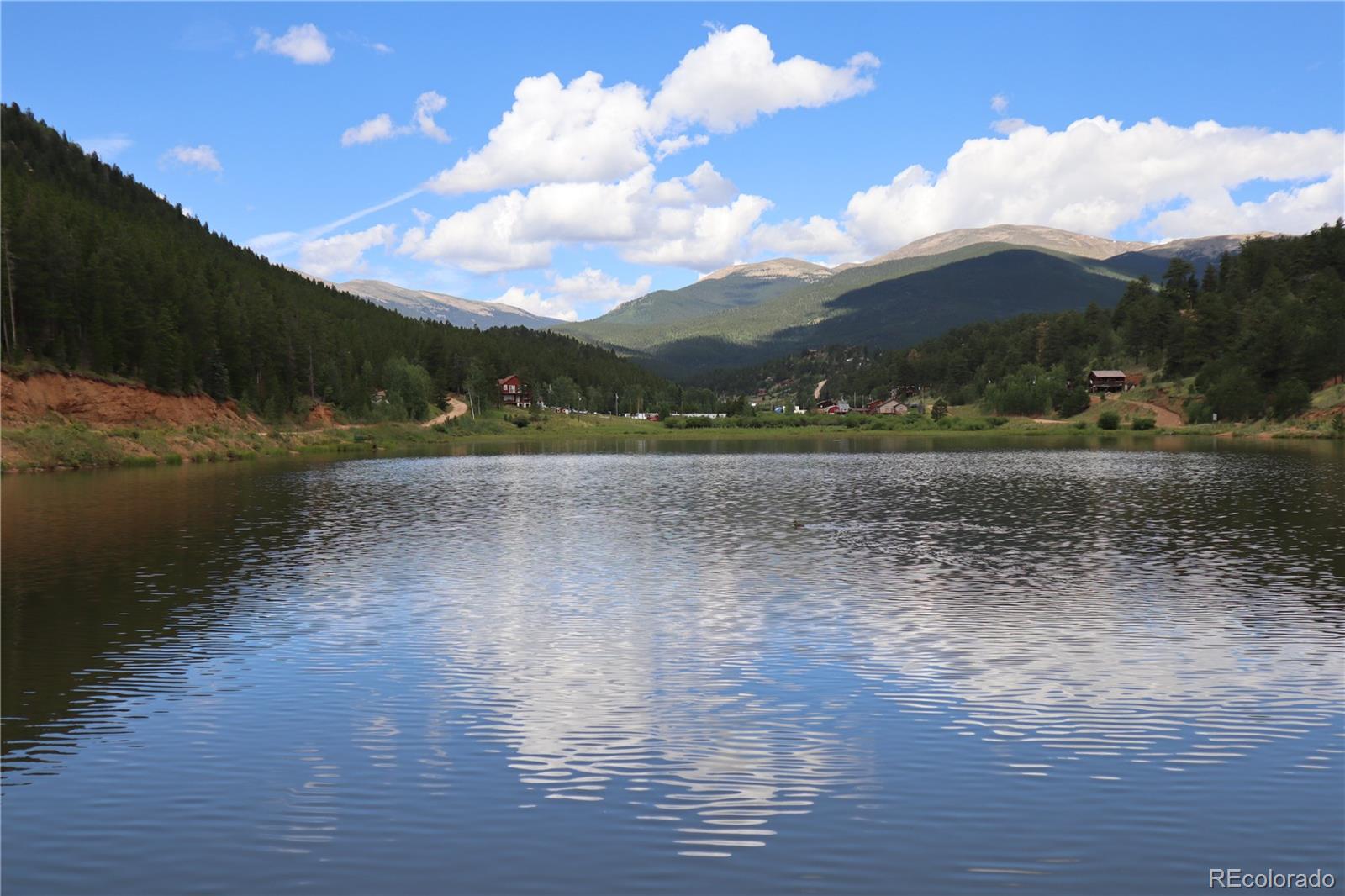 430 Lakeview Road Bailey, CO 80421 - Photo 7 of 10 a view of a lake view with houses in back