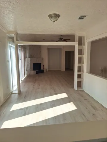 an empty room with windows