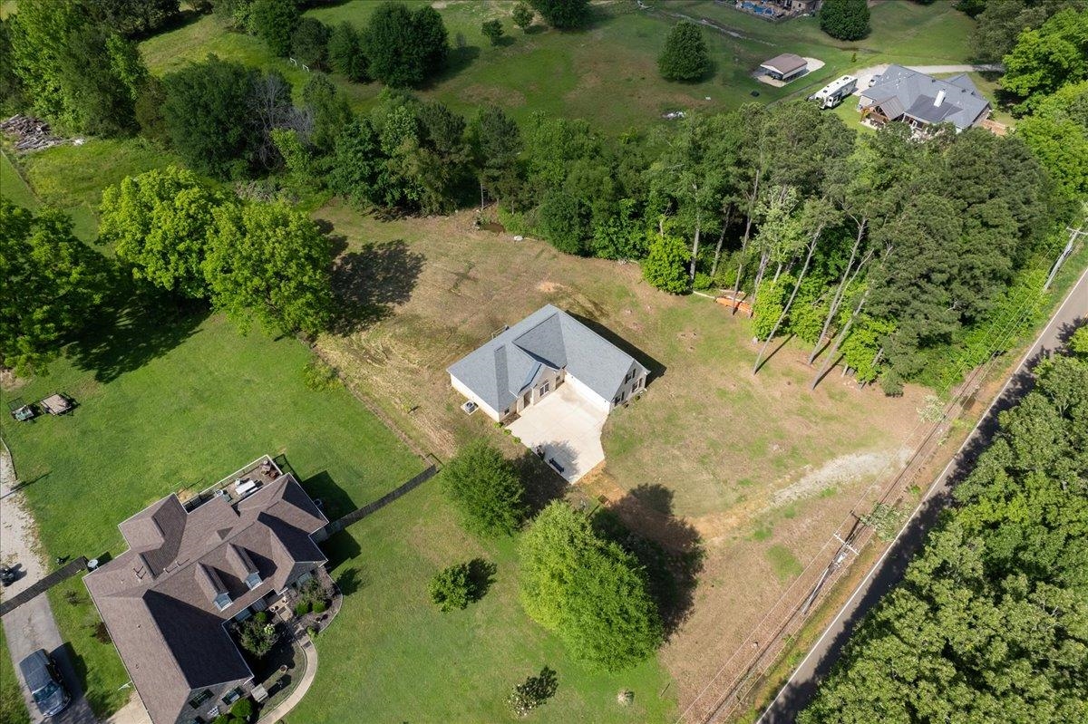9370 Pleasant Ridge Road Arlington, TN 38002 - Photo 10 of 24 an aerial view of a house with a yard