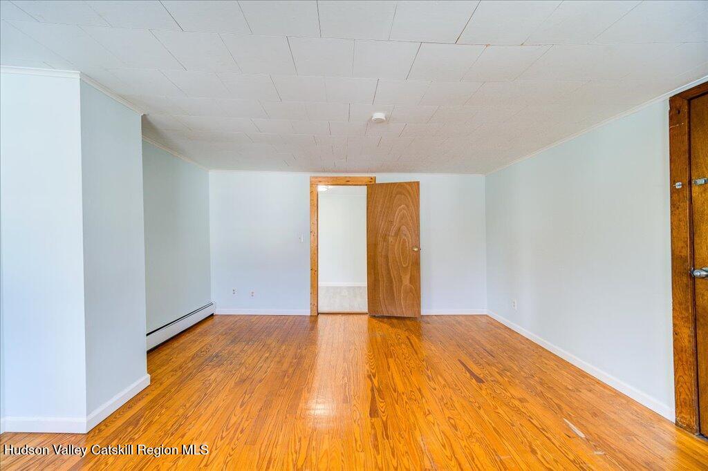 385 Main Street Rosendale, NY 12472 - Photo 11 of 23 a view of empty room with wooden floor