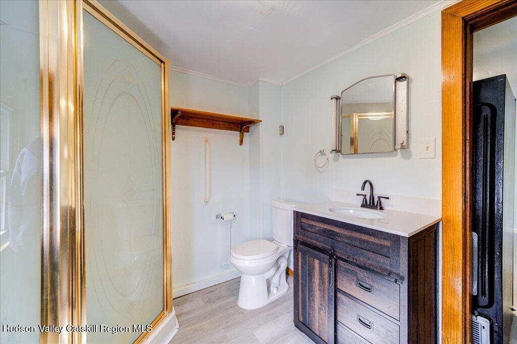 385 Main Street Rosendale, NY 12472 - Photo 13 of 23 a bathroom with a sink a toilet and a mirror