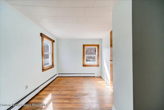 a view of an empty room and window