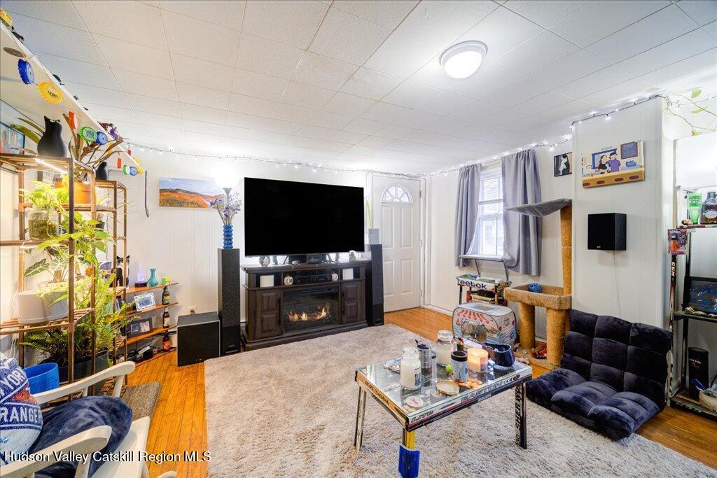 385 Main Street Rosendale, NY 12472 - Photo 19 of 23 a living room with furniture and a flat screen tv