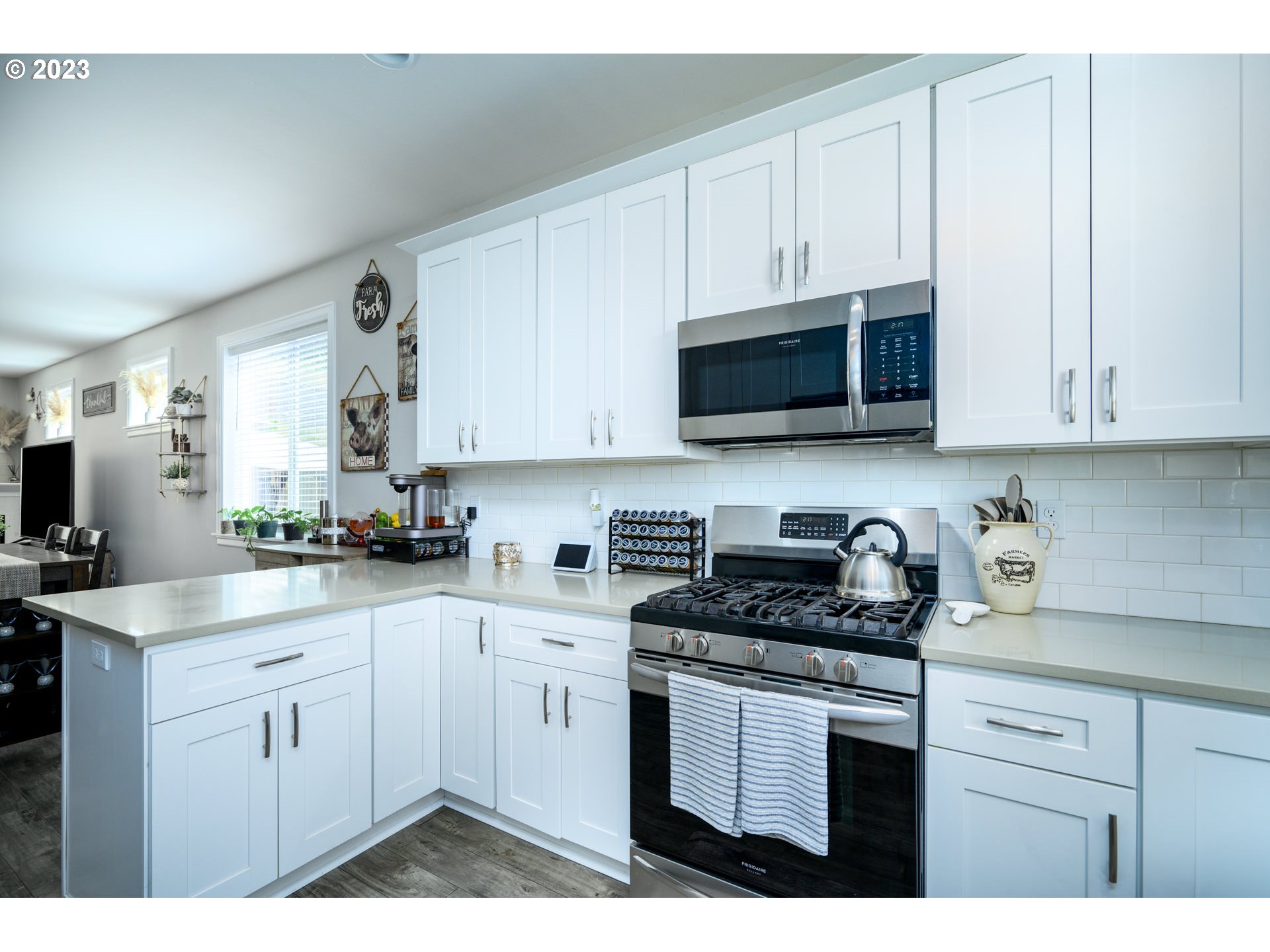 501 Merlot Street Amity, OR 97101 - Photo 14 of 44 a kitchen with stainless steel appliances granite countertop white cabinets sink and stove