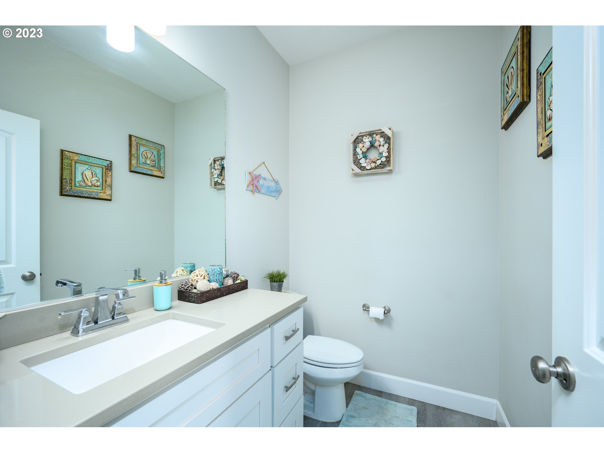 501 Merlot Street Amity, OR 97101 - Photo 15 of 44 a bathroom with a sink mirror vanity and toilet