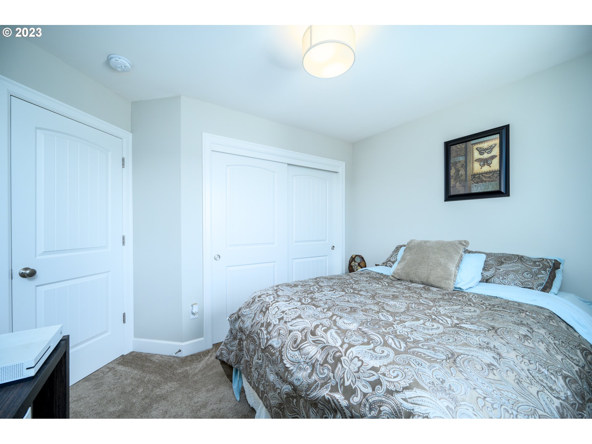 501 Merlot Street Amity, OR 97101 - Photo 23 of 44 a bedroom with a bed and a cabinets