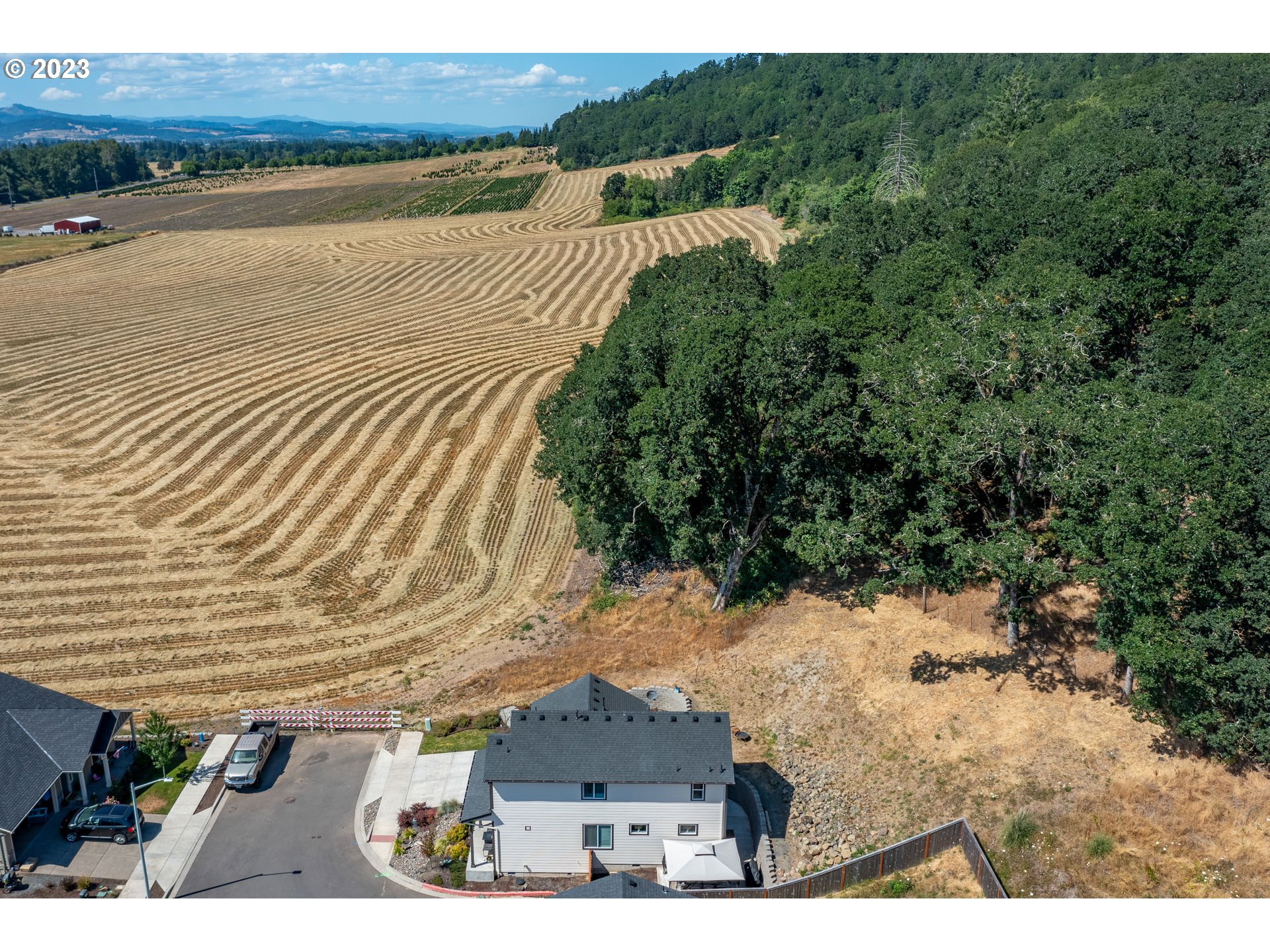501 Merlot Street Amity, OR 97101 - Photo 30 of 44 a view of a lake with a yard