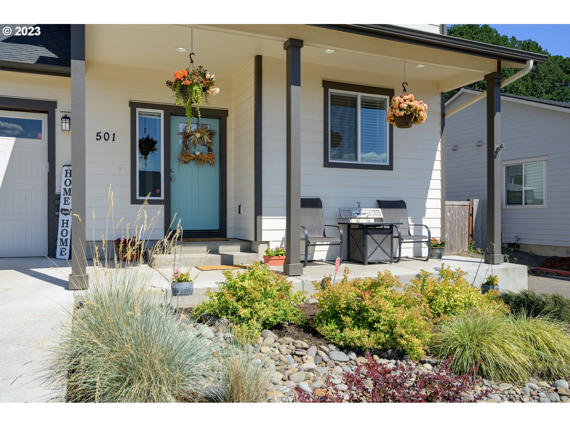 501 Merlot Street Amity, OR 97101 - Photo 3 of 44 a view of a house with potted plants