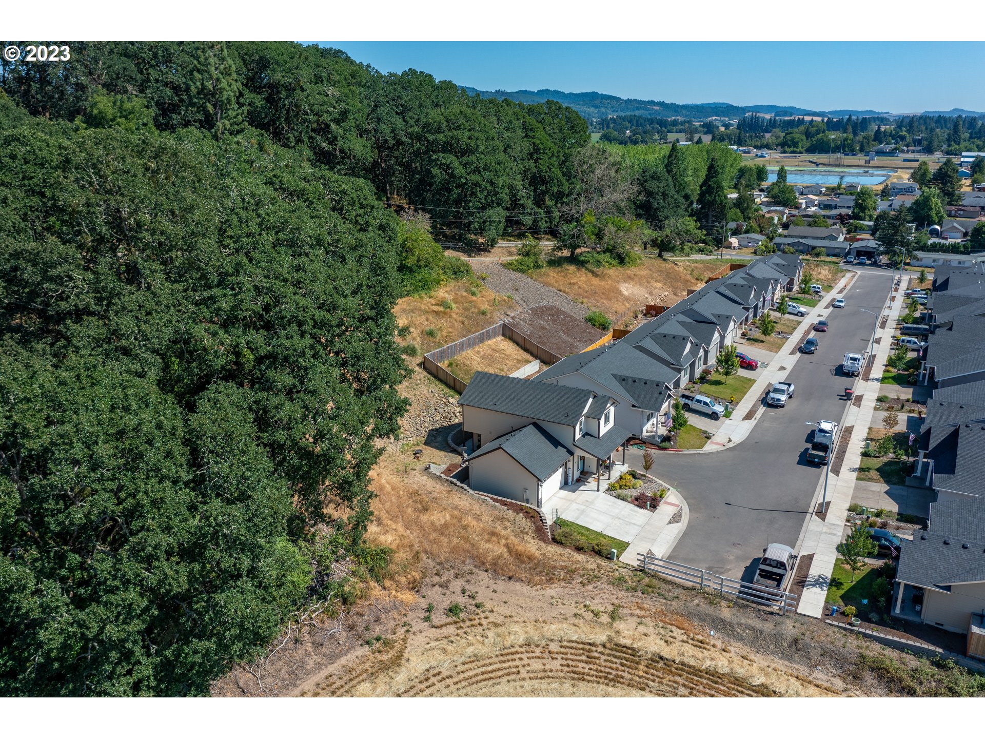 501 Merlot Street Amity, OR 97101 - Photo 32 of 44 an aerial view of a house with a yard
