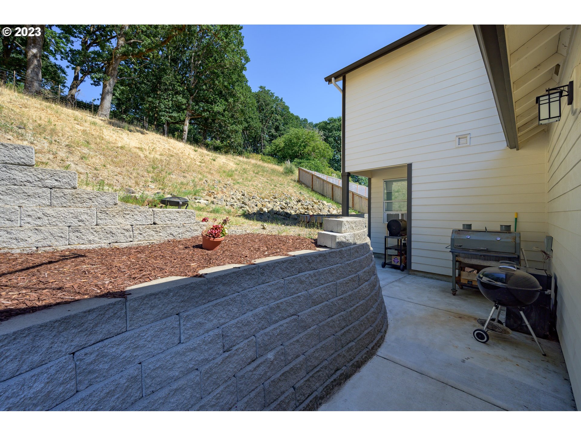 501 Merlot Street Amity, OR 97101 - Photo 38 of 44 a view of a backyard with hardwood