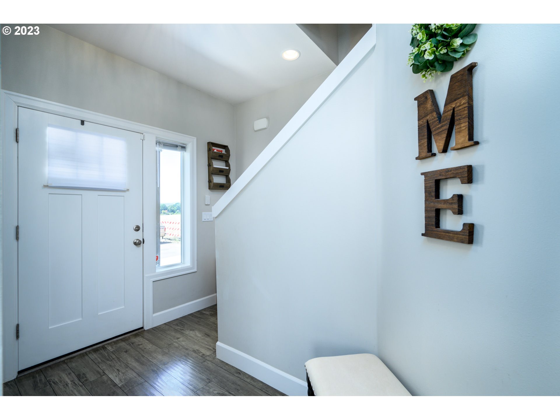 501 Merlot Street Amity, OR 97101 - Photo 6 of 44 a view of an entryway with wooden floor