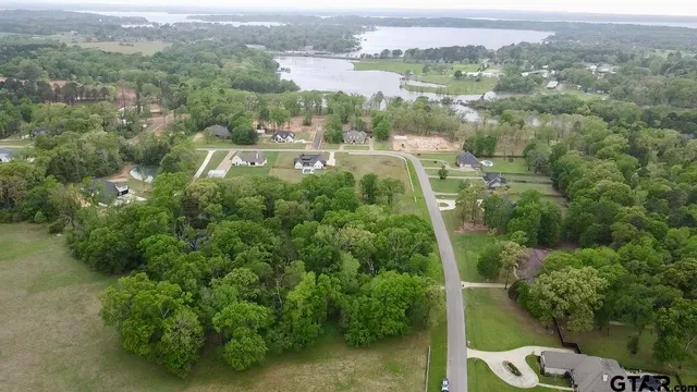 a view of a golf course with a lake