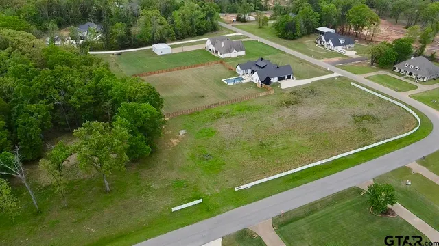 a view of backyard with green space