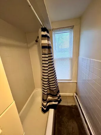 a view of bathroom with a window