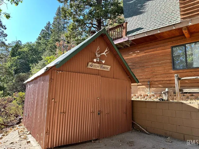 a view of a house with a roof deck