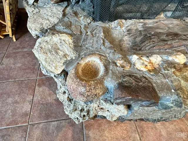 a vase of flowers sitting on a table