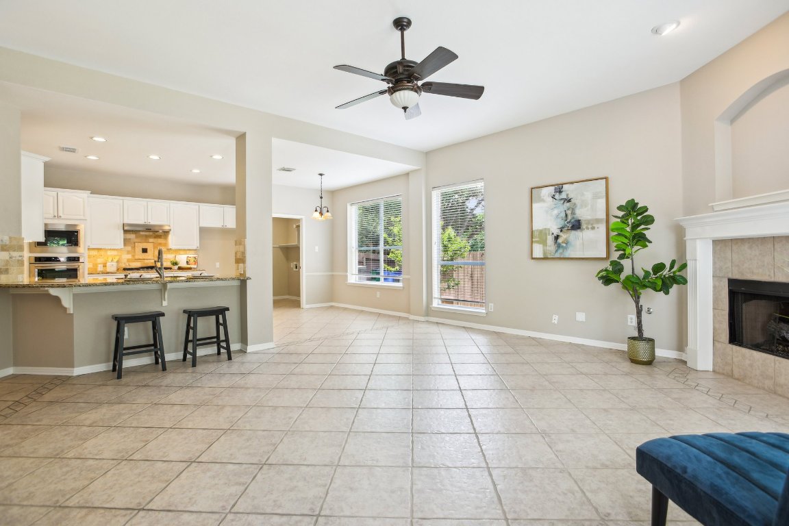a view of kitchen with furniture and a potted plant