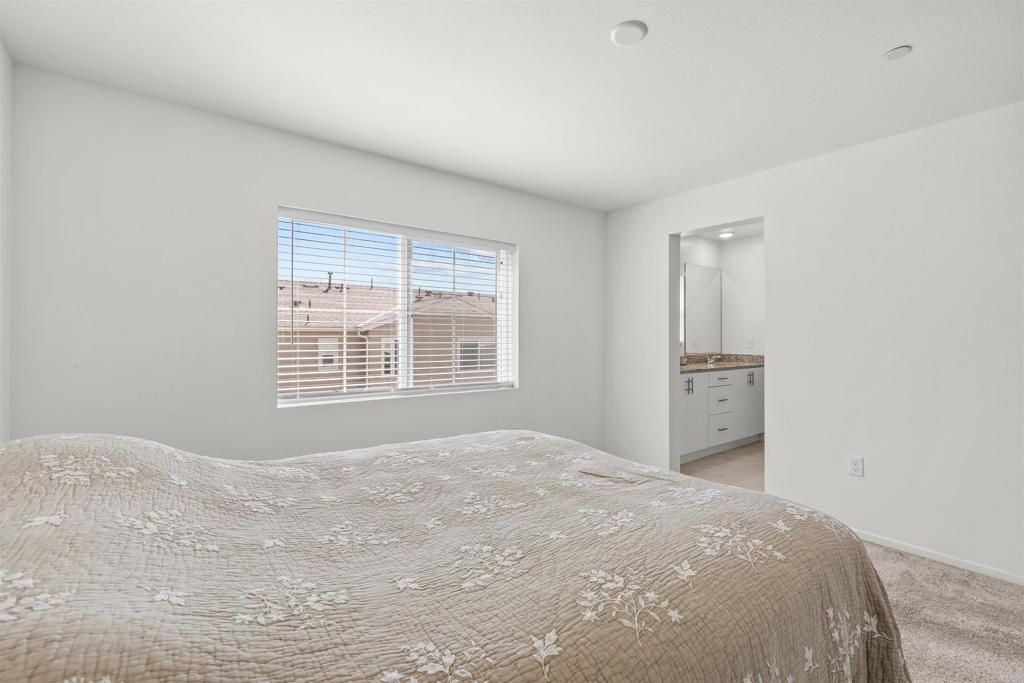 355 Citrine Trail Fallbrook, CA 92028 - Photo 14 of 27 a bedroom with a bed and a window