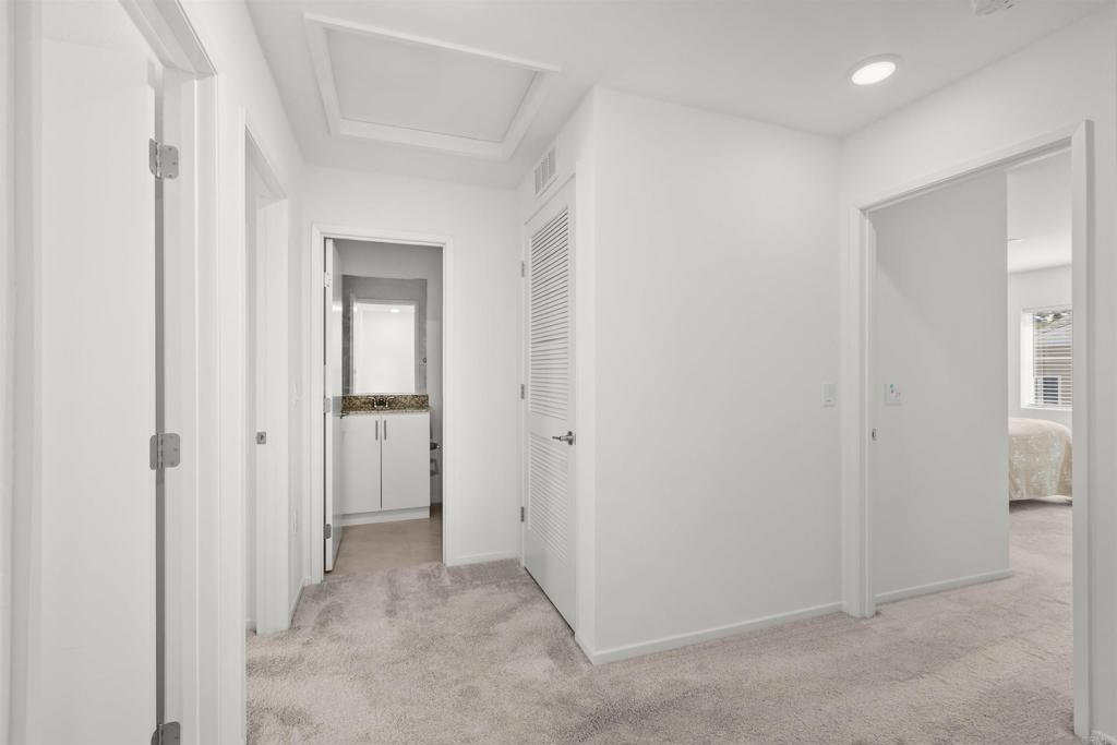 355 Citrine Trail Fallbrook, CA 92028 - Photo 17 of 27 a view of a hallway with closet area