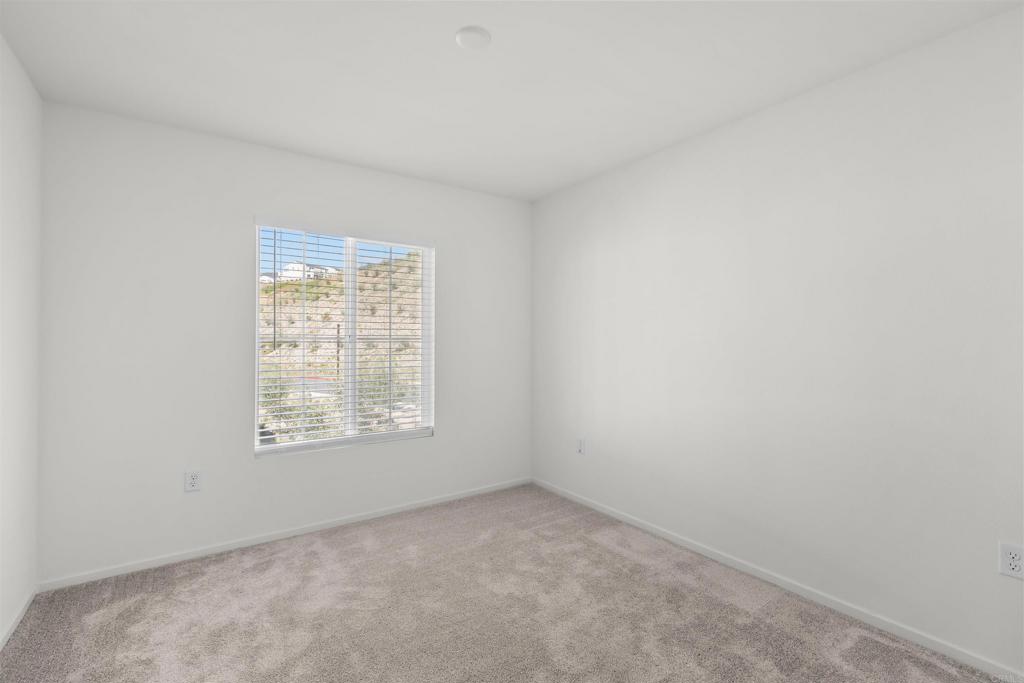 355 Citrine Trail Fallbrook, CA 92028 - Photo 18 of 27 an empty room with a window