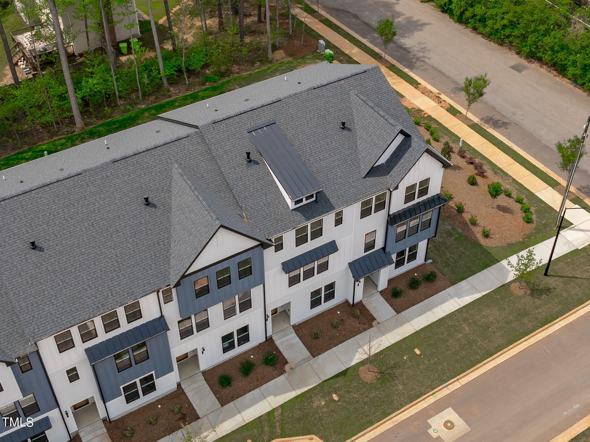 6415 Tanner Oak Lane Raleigh, NC 27613 - Photo 1 of 56 a view of building with yard