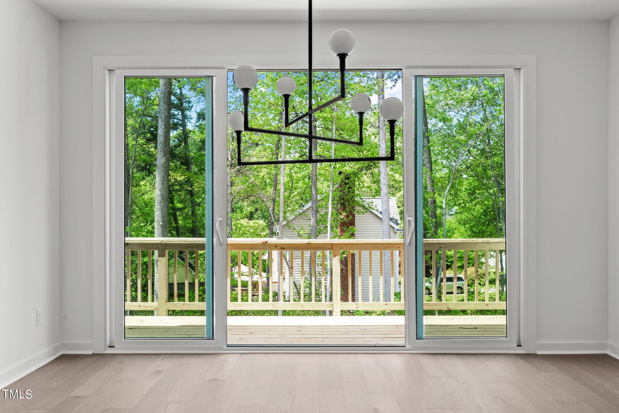 6415 Tanner Oak Lane Raleigh, NC 27613 - Photo 12 of 56 a view of a room that has a bed in it