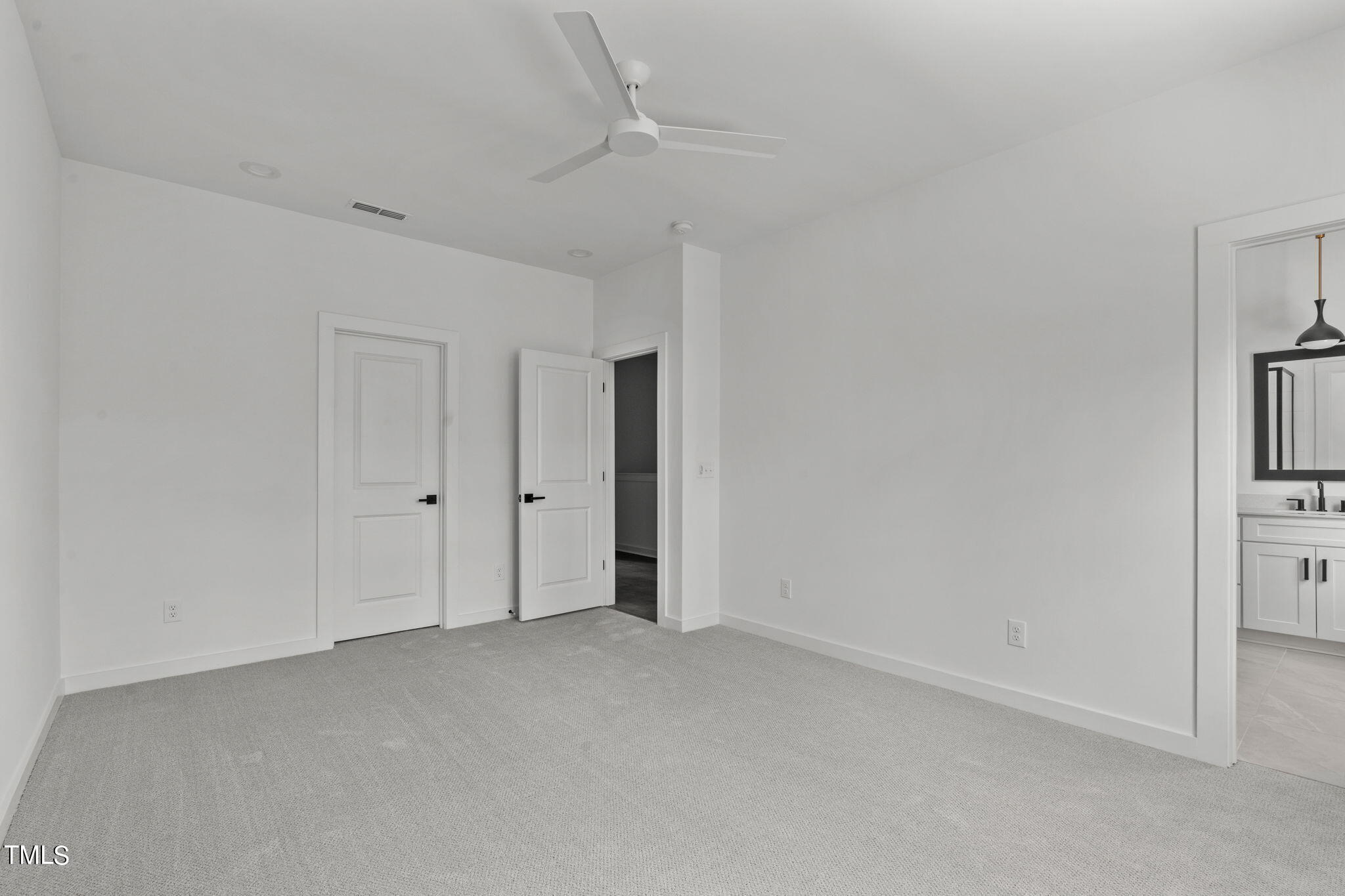 6415 Tanner Oak Lane Raleigh, NC 27613 - Photo 19 of 56 a view of an empty room
