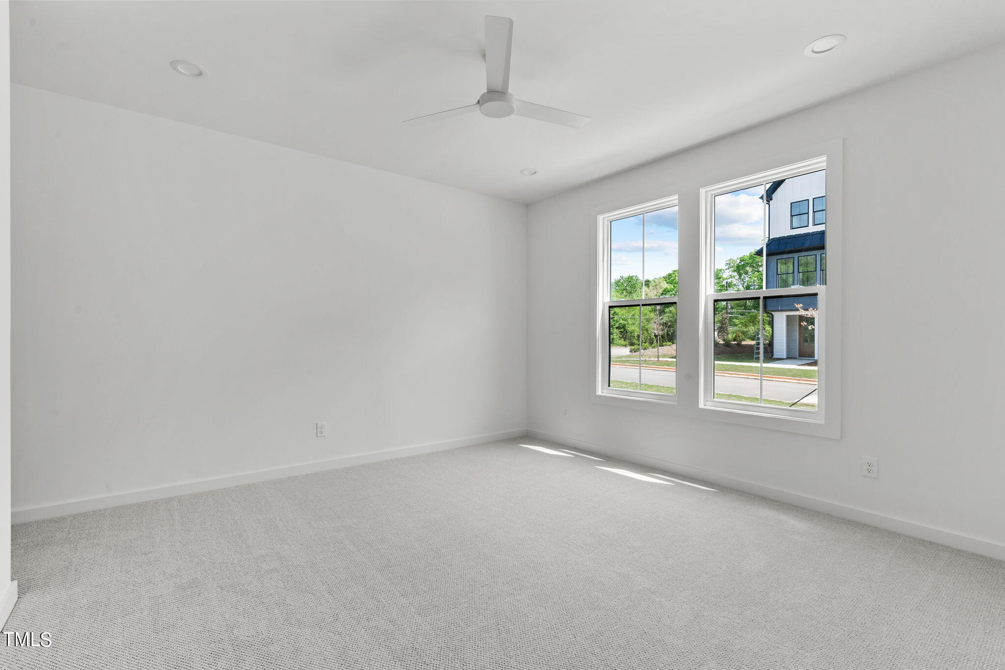 6415 Tanner Oak Lane Raleigh, NC 27613 - Photo 31 of 56 an empty room with windows