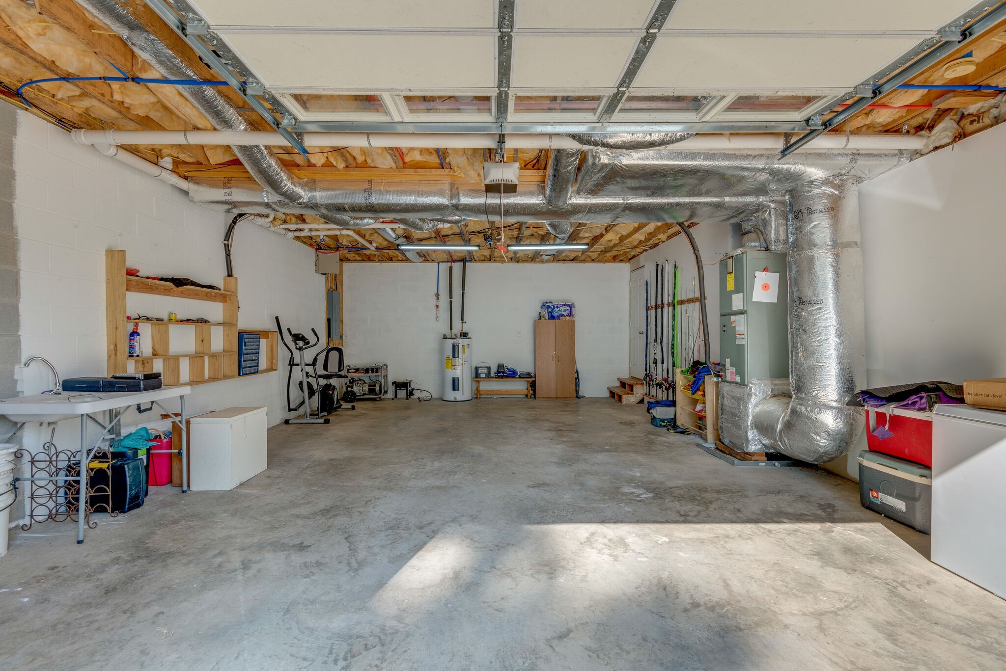 508 Gunson Ridge Road Cumberland City, TN 37050 - Photo 12 of 56 a view of a room with wooden floor and windows