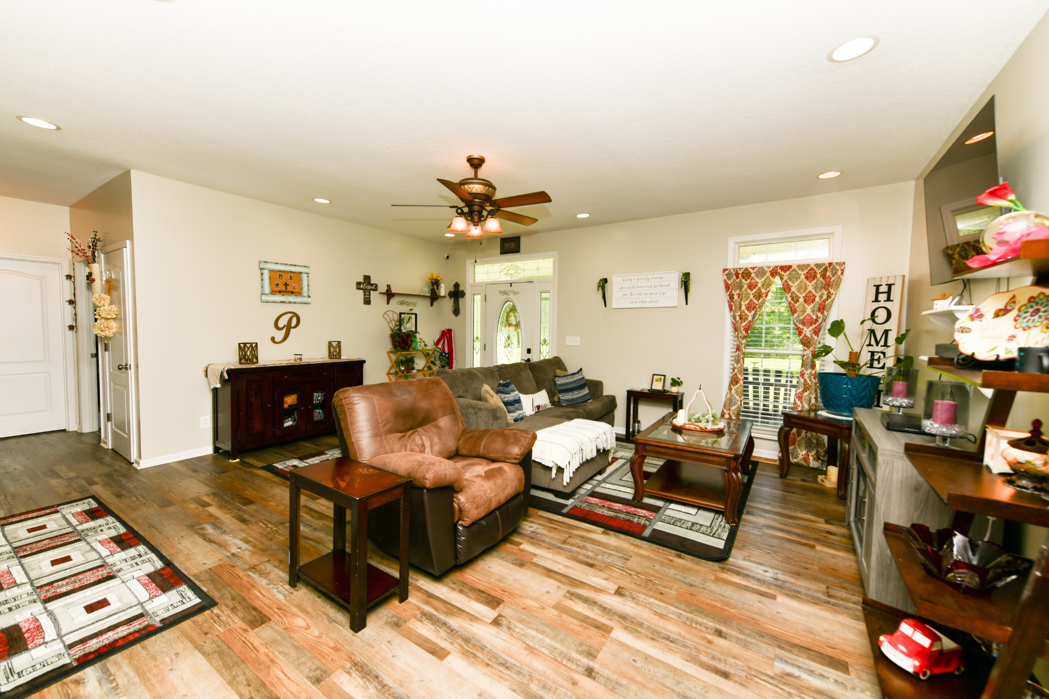 508 Gunson Ridge Road Cumberland City, TN 37050 - Photo 20 of 56 a living room with furniture and wooden floor