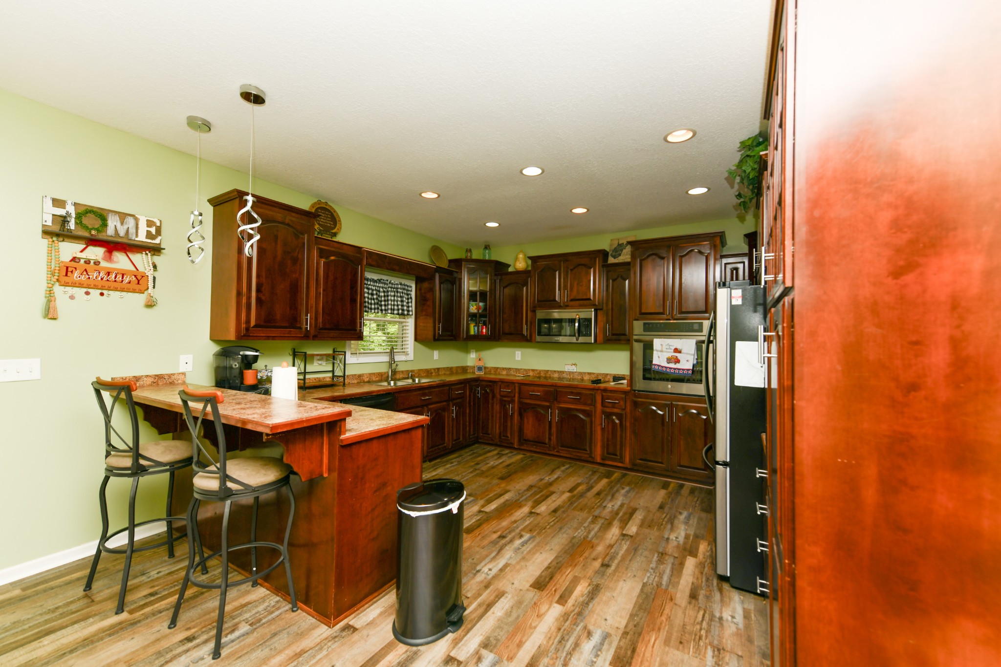 508 Gunson Ridge Road Cumberland City, TN 37050 - Photo 27 of 56 a kitchen with a sink and counter top space
