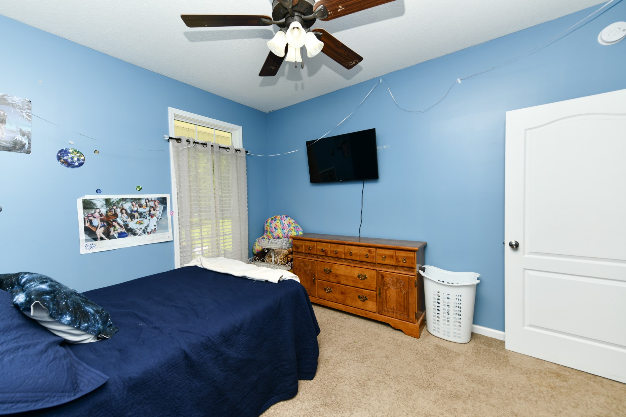 508 Gunson Ridge Road Cumberland City, TN 37050 - Photo 29 of 56 a bedroom with a bed and a flat screen tv