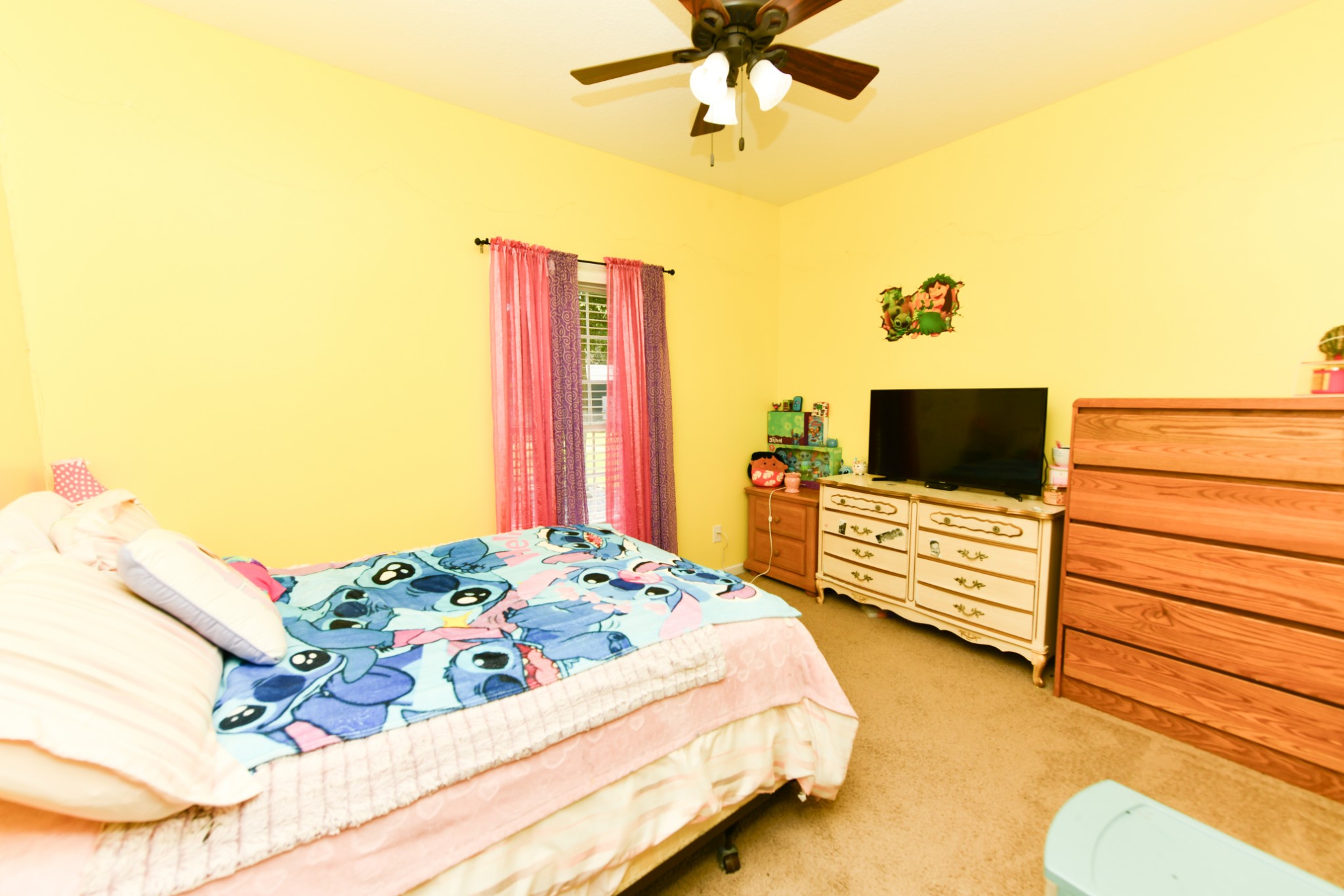 508 Gunson Ridge Road Cumberland City, TN 37050 - Photo 36 of 56 a bedroom with a bed and wooden floor
