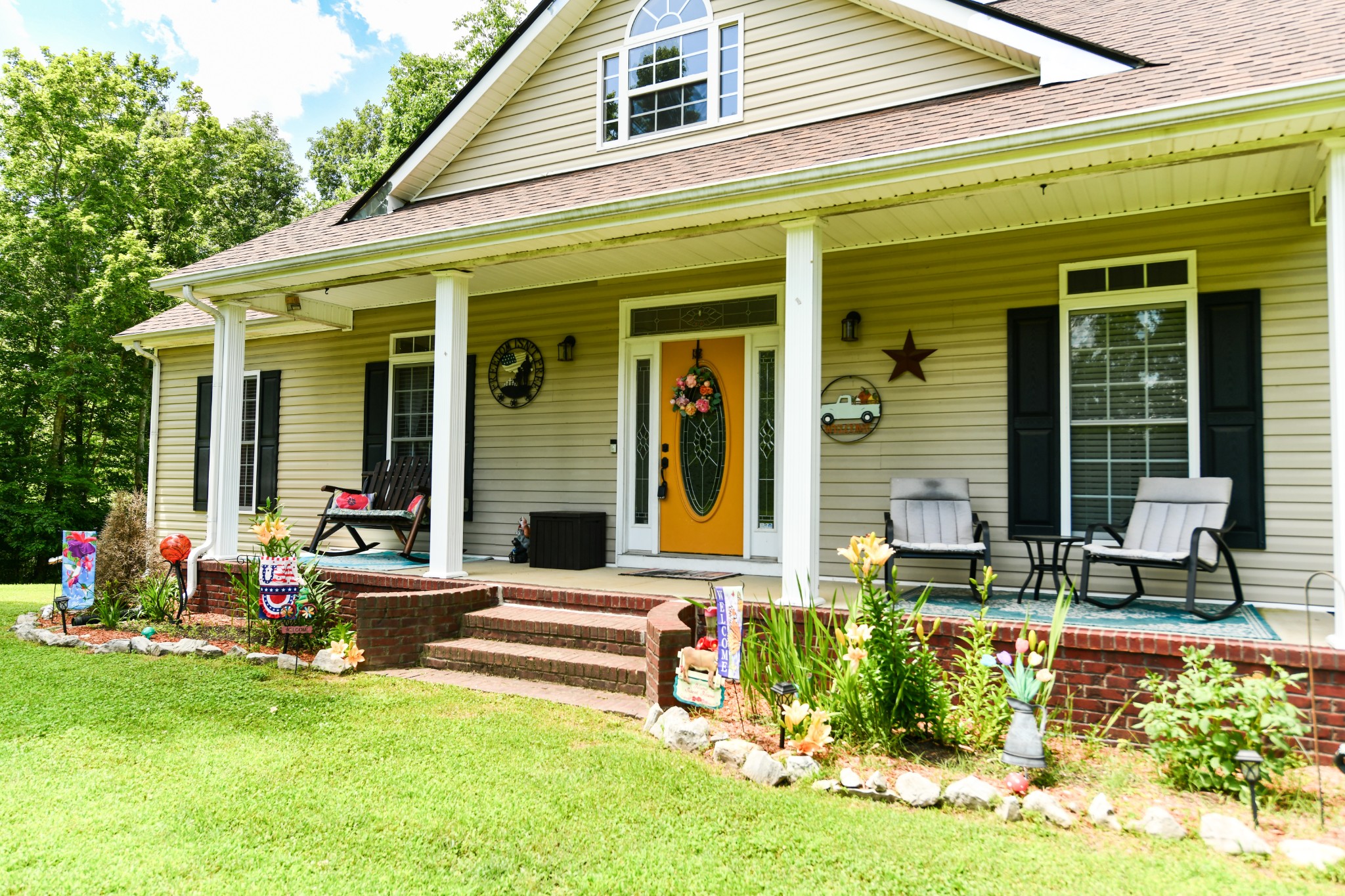 508 Gunson Ridge Road Cumberland City, TN 37050 - Photo 5 of 56 a front view of house with outdoor seating
