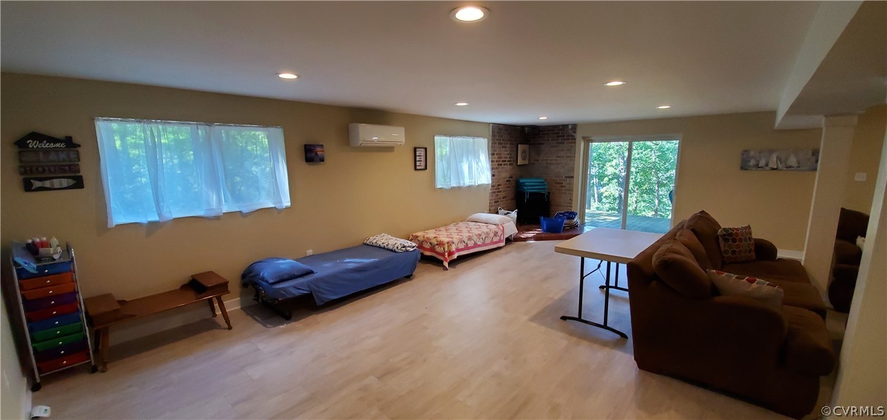 347 Hickory Road Lancaster, VA 22503 - Photo 26 of 48 a living room with furniture and a window