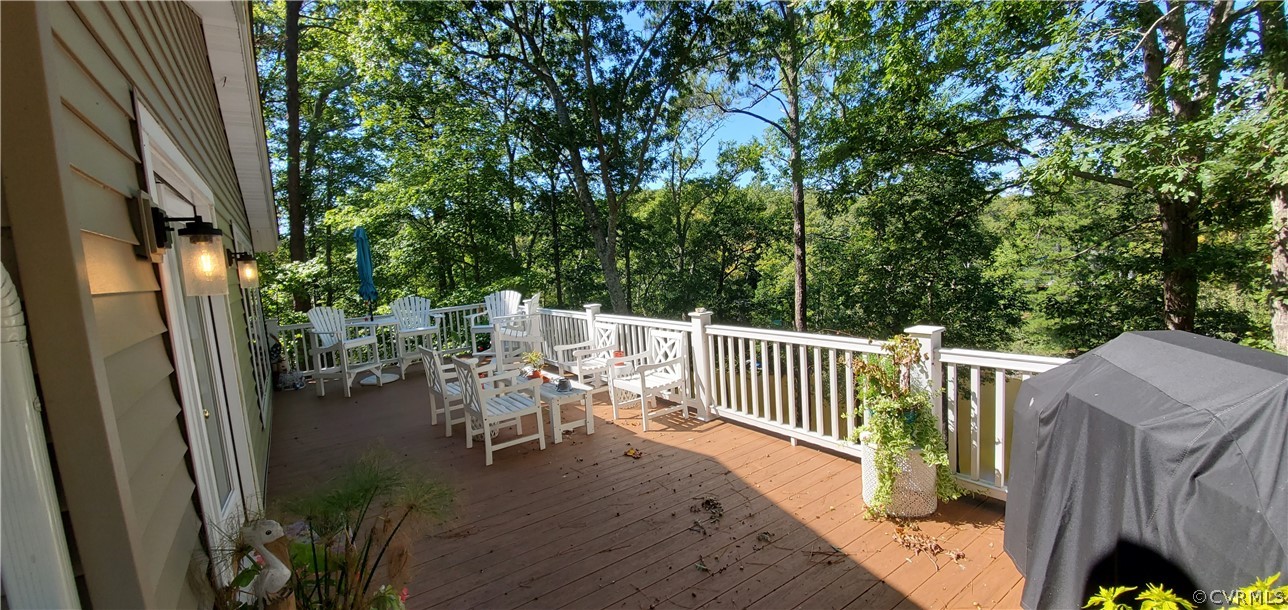 347 Hickory Road Lancaster, VA 22503 - Photo 3 of 48 a view of a chair and tables in the balcony