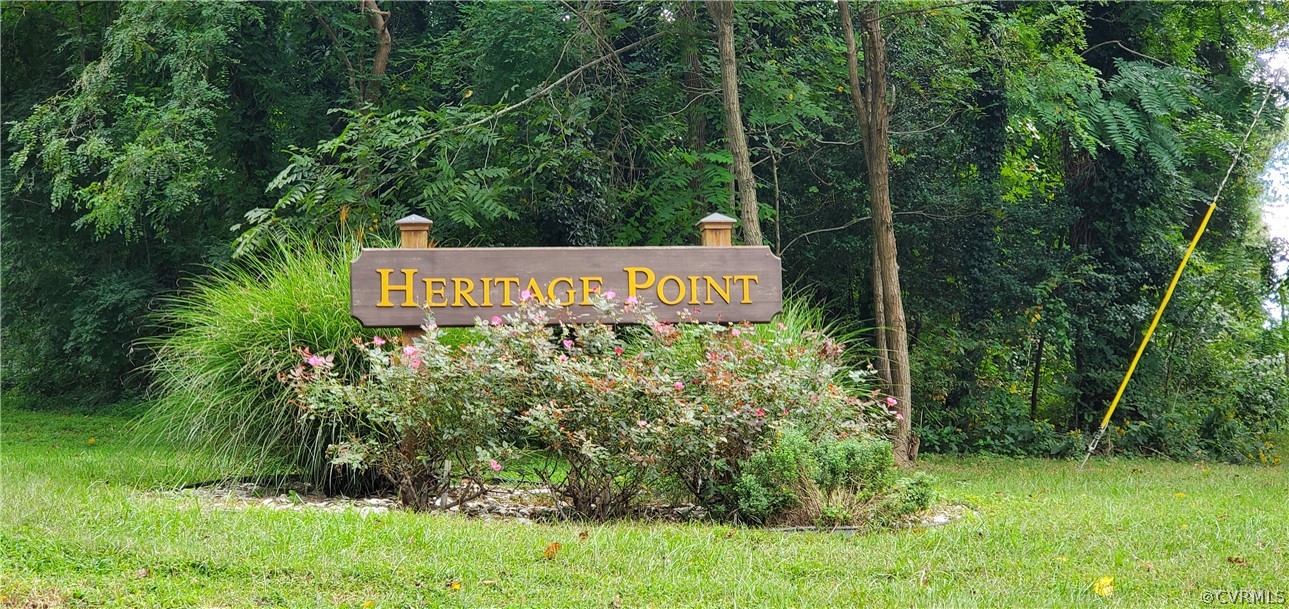 347 Hickory Road Lancaster, VA 22503 - Photo 48 of 48 a sign that is sitting in front of a tree