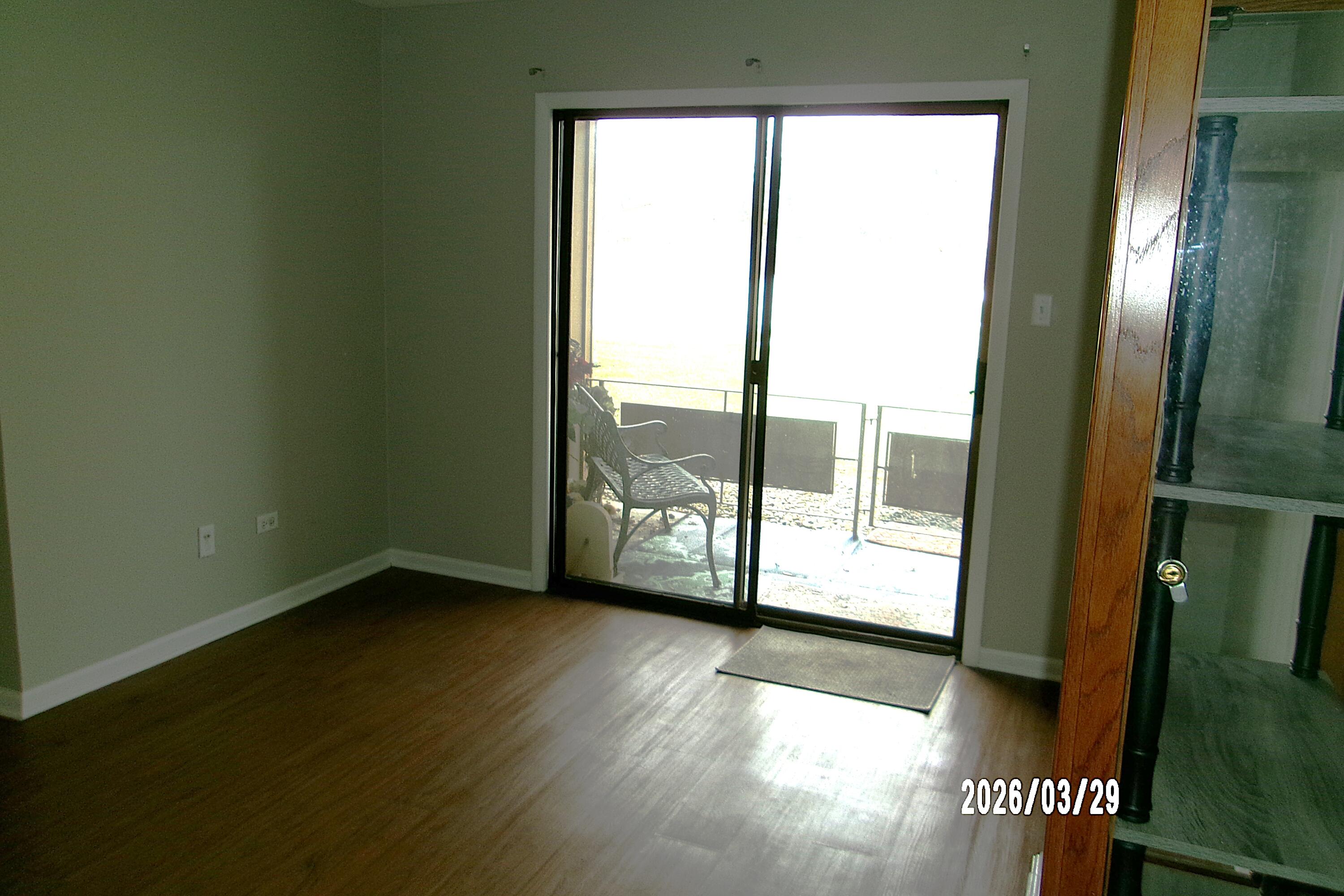 405 Old Stone Road, Unit E2 Munster, IN 46321 - Photo 6 of 20 a view of an empty room and window