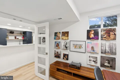 a bedroom with furniture and a fireplace