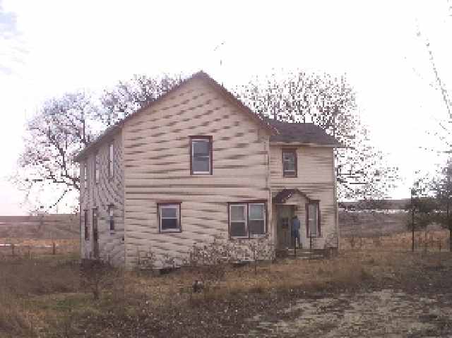 5264 East Johnson Road Freeport, IL 61032 - Photo 2 of 4 a view of a house with a yard