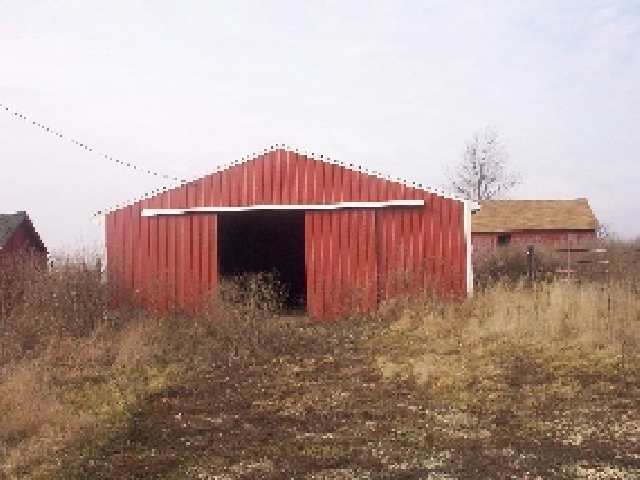5264 East Johnson Road Freeport, IL 61032 - Photo 3 of 4 a view of a backyard