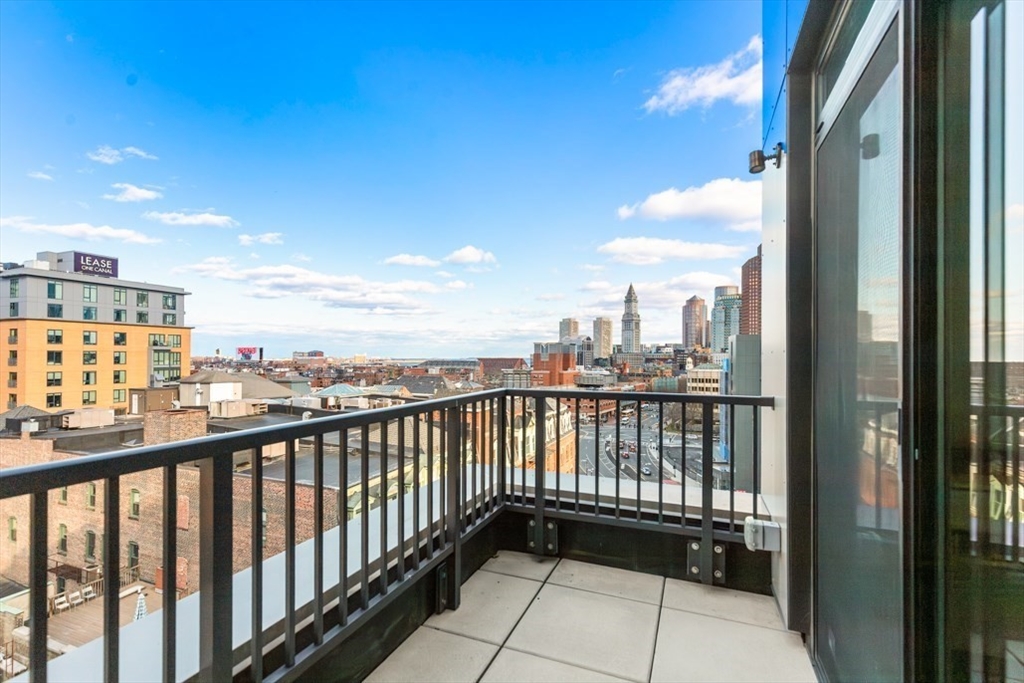 121 Portland Street, Unit 902 Boston, MA 02114 - Photo 11 of 25 a view of city from a balcony