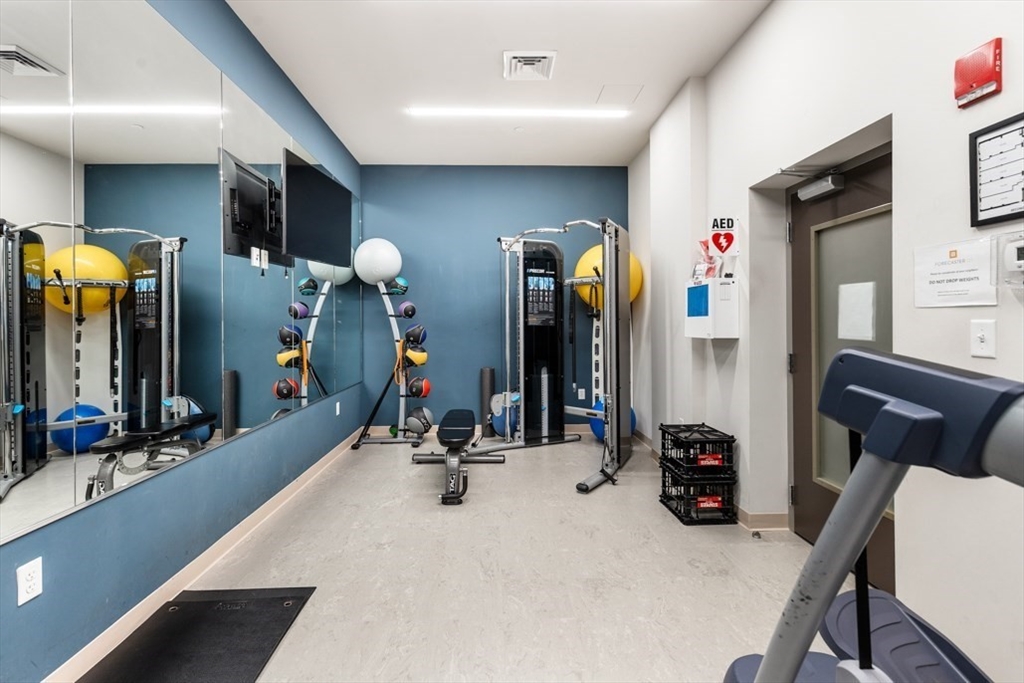 121 Portland Street, Unit 902 Boston, MA 02114 - Photo 24 of 25 a view of a room with gym equipment