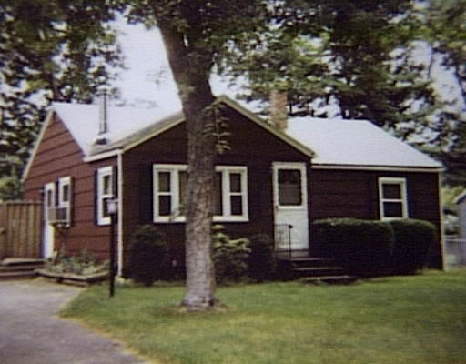 141 Bretton Road Springfield, MA 01119 - Photo 1 of 1 front view of a house with a yard