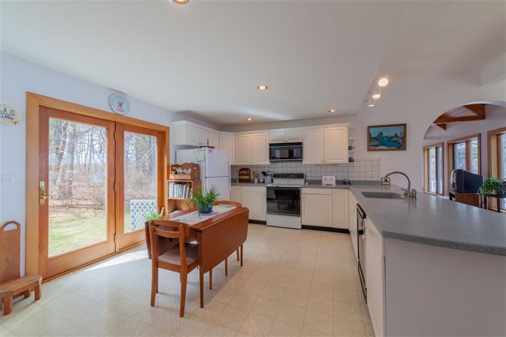 41 Highland Ridge Road Boothbay, ME 04537 - Photo 12 of 22 The kitchen with white cabinets...