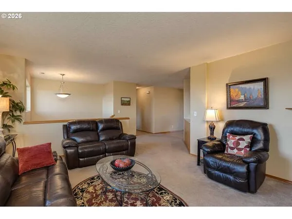 a living room with furniture and a couch